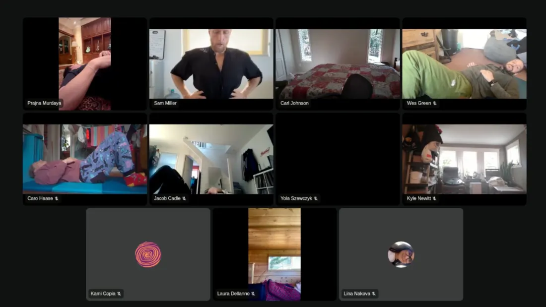 Members practicing floor work on a live Posture Dojo session with Sam Miller
